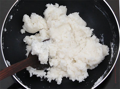 mixing the dough for ukkarisida akki rotti or plain rice flour roti