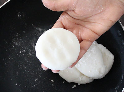 mixing the flour for ukkarisida akki rotti or plain rice flour roti