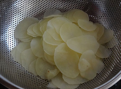 drain the water for sun dried potato chips or aloo chips