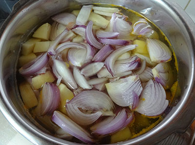 chopped potato and onions for potato onion sambar