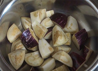 chopped brinjal for badanekayi gojju or brinjal curry