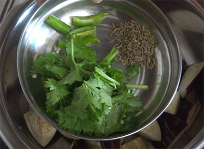cumin seeds, green chili and coriander leaves for badanekayi gojju or brinjal curry