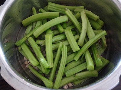 cooking beans and stem for basale sambar or huli or koddel