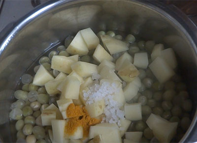cooking potato for batani gasi or udupi style green peas curry