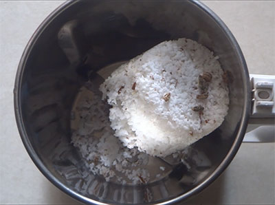 coconut and cardamom for bella kayi burfi or coconut jaggery burfi