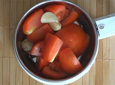 tomato, ginger and garlic for bendekai gojju or bhindi curry