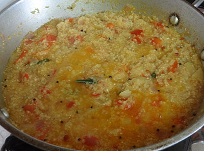cooking godhi kadi uppittu or broken wheat upma