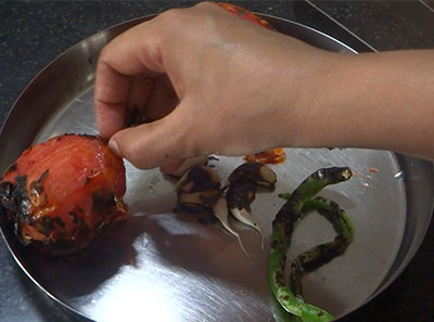 peeling tomatoes for burnt or charred tomato chutney recipe