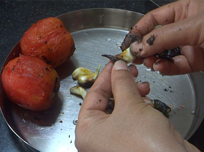 peeling garlic for burnt or charred tomato chutney recipe