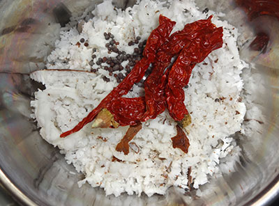 grind coconut and red chili for sihi kumbalakai palya or pumpkin stir fry
