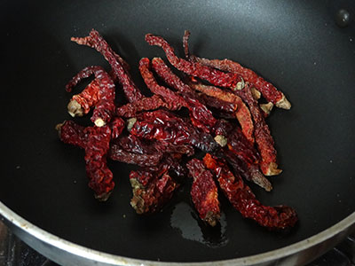 roasting red chili for karibevu chutney pudi or curry leaves chutney powder