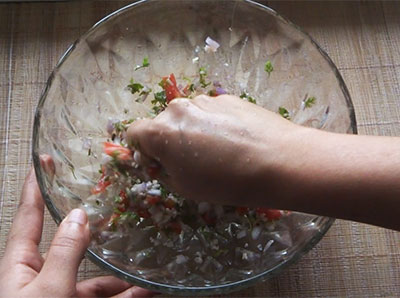 mixing ingredients for kalasida avalakki or dadpe poha recipe