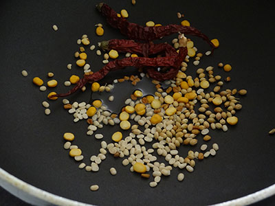 roasting spices for drakshi gojju or raisins curry