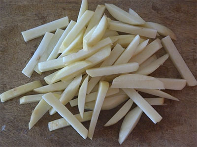 slicing potatoes for french fries or finger chips