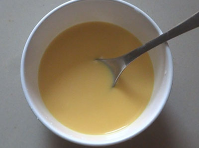 cutard powder in milk for fruit custard or fruit salad recipe