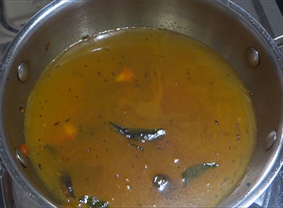water for garlic rasam or bellulli saaru recipe