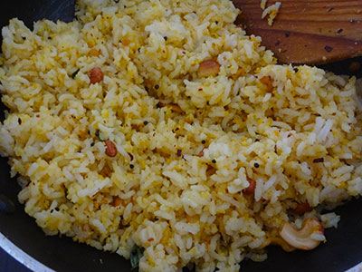 mixing garlic rice