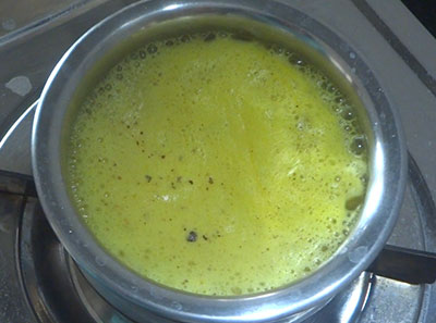 boiling golden milk or turmeric milk recipe