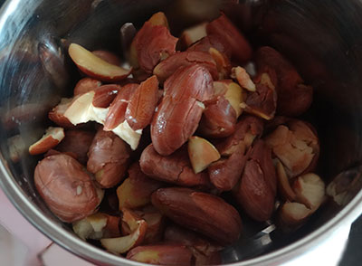 cooking and grinding jackfruit seeds for halasina beejada saaru or jackfruit seeds rasam