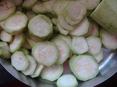 ridge gourd slices for heerekai bajji or heerekayi bonda