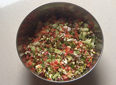 making hesarukalu kosambari or moong sprouts salad