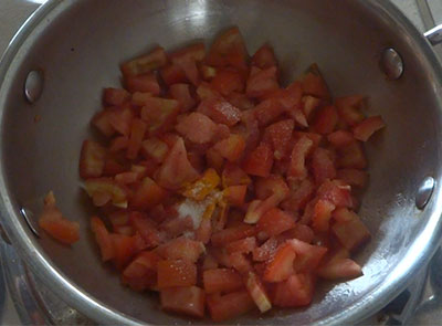 tomato, turmeric and salt for jeerige saaru or jeera rasam recipe