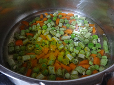 cooking vegetables for khara bath or masala rava bath