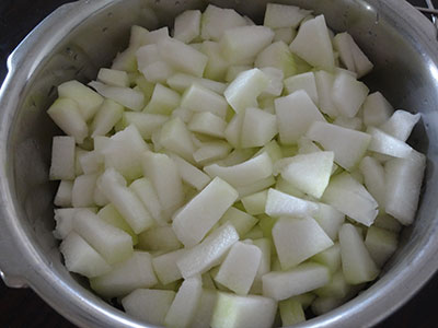 wash and chop cabbage for boodu kumbalakai palya or ash gourd stir fry
