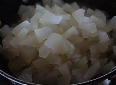 Chopped cabbage for boodu kumbalakai palya or ash gourd stir fry