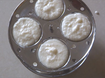 batter in idli moulds for cooked rice idli or leftover rice idli