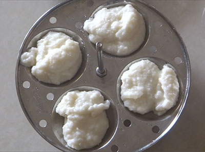 batter in idli moulds for cooked rice idli or leftover rice idli