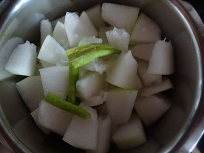 cut and cook ash gourd for majjige huli