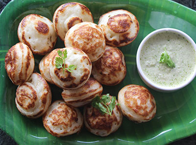 cook majjige paddu or mosaru appa recipe on both sides