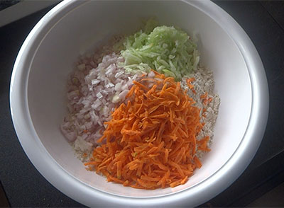 onion, carrot and cucumber for masale jolada rotti or masala jowar roti recipe