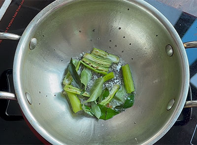 green chillies, ginger and curry leaves for mavinakayi tovve or mango dal recipe
