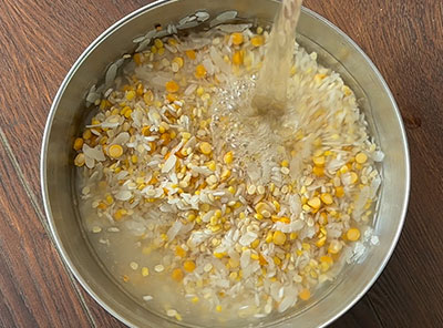 rinsing and soaking rice and dal for mixed dal tomato onion uttappam or dosa recipe