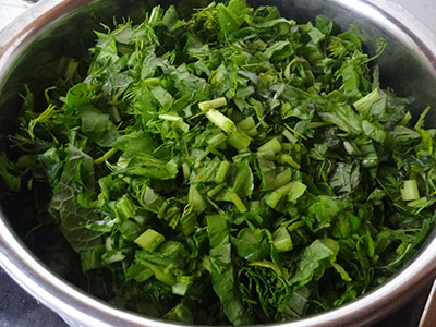 chopped green leaves for mixed greens sambar or soppina huli saaru