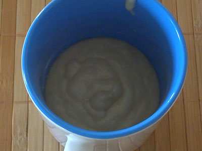 cake batter in a mug for vanilla mug cake microwave eggless recipe