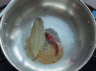 tempering for palak siridhanya khichdi recipe