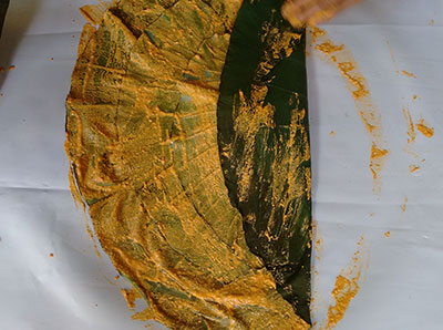 folding the colocasia leaves for pathrode