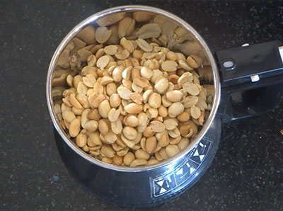 peanuts in mixie jar for peanut butter recipe