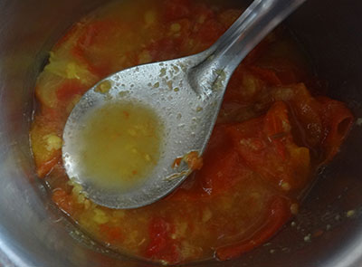 mash tomato and dal for menasina saaru or pepper rasam