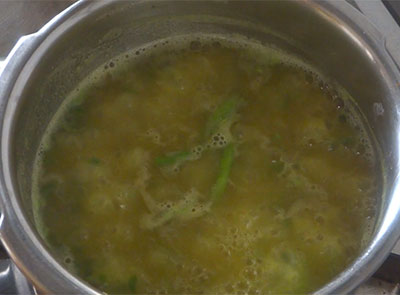 boiling potato rasam or alugadde saaru