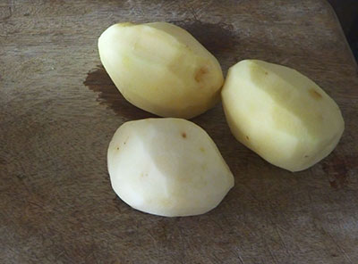 peeled potatoes for potato upkari or batata talasani recipe
