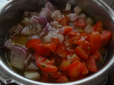 cooking vegetabes for radish sambar or moolangi sambar