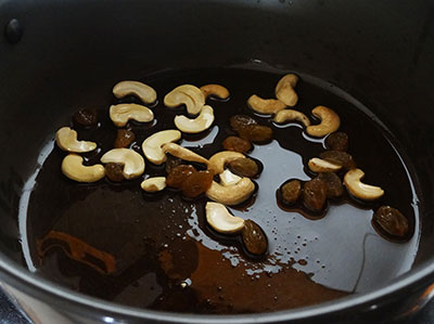 frying cashews and raisins for rave payasa or rava kheer