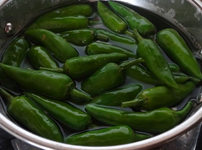 chilies in boiling water for sandige menasu or majjige menasu