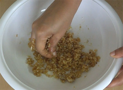mixing ingredients for sihi avalakki.