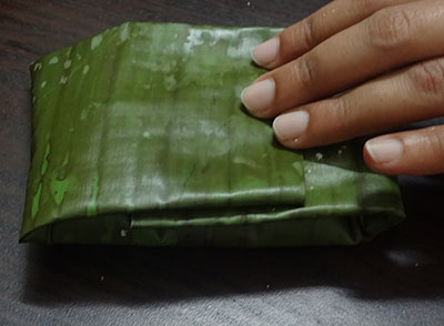 batter inside the banana leaf for southe gatti or cucumber dumplings