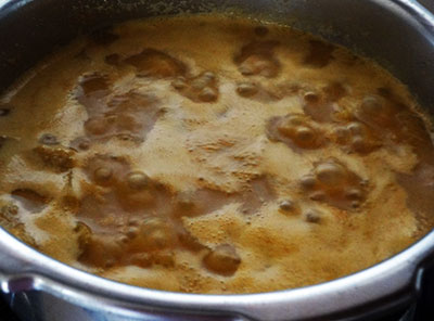 boiling suvarna gadde huli or yam sambar